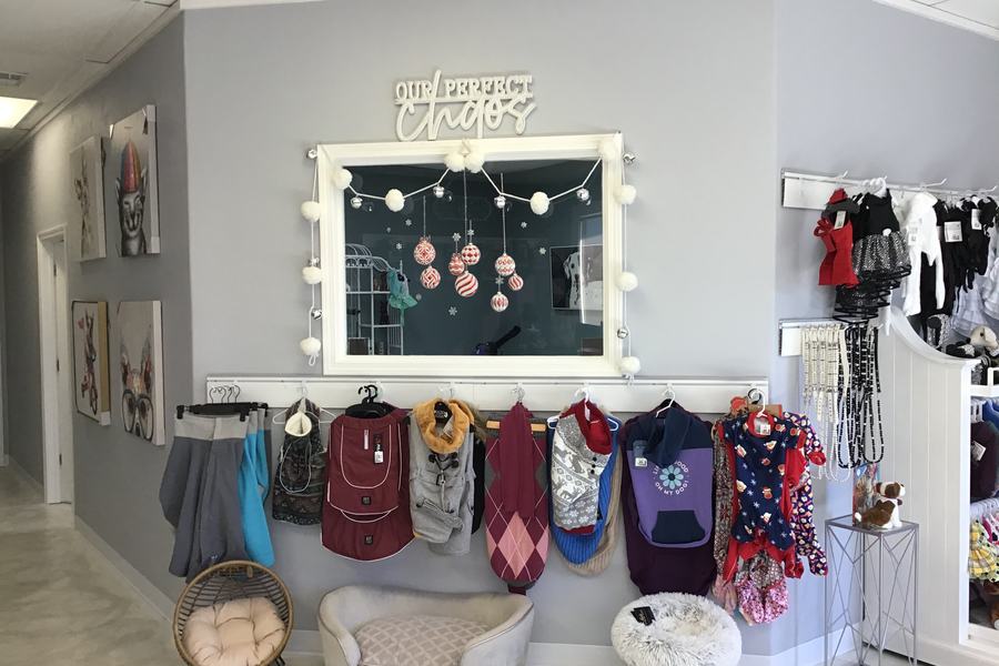 Styling vanity with lights, clothing hooks, retail display