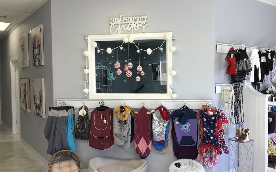 Styling vanity with lights, clothing hooks, retail display